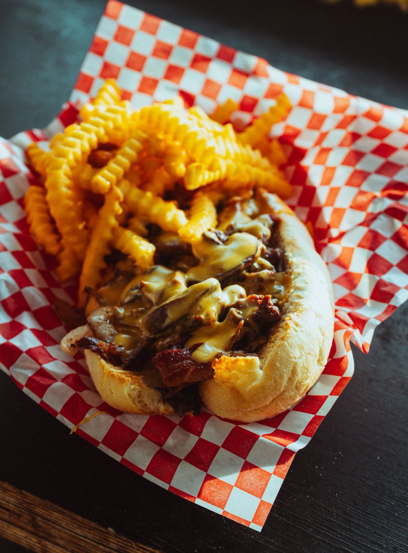Loaded cheesesteak with crinkle fries