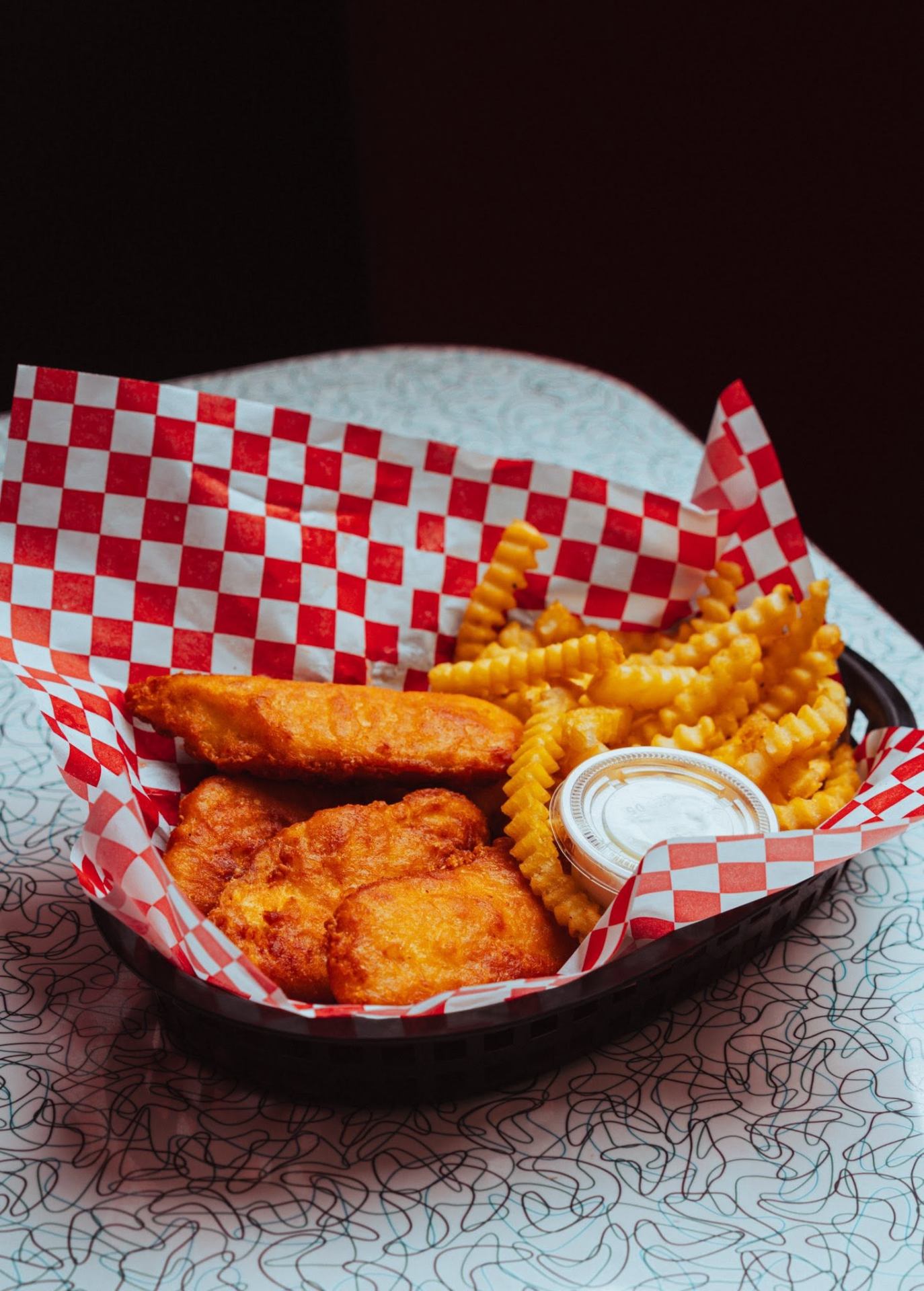 Crispy chicken tenders with crinkle fries and ranch